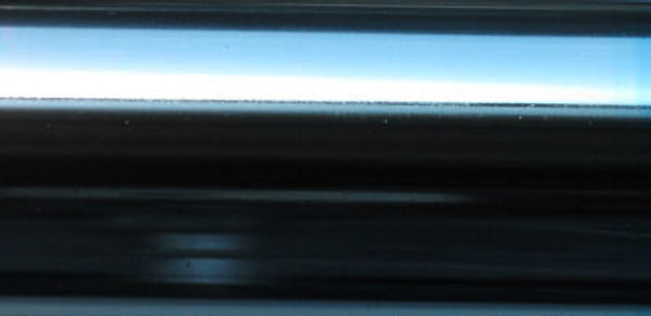 Close-up view of Alclad II hot metal blue lacquer paint in glossy finish for model painting