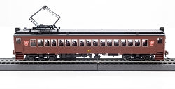 Con-Cor International HO scale Keystone car #449 model brown passenger railcar on track