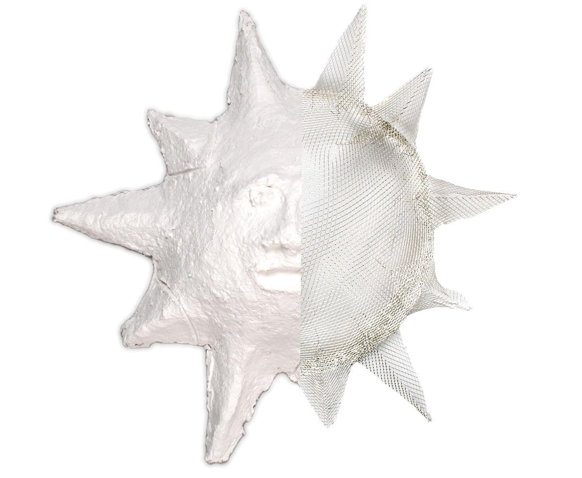 Sun sculpture showing white Sculptamold modeling material applied over a wire mesh armature.