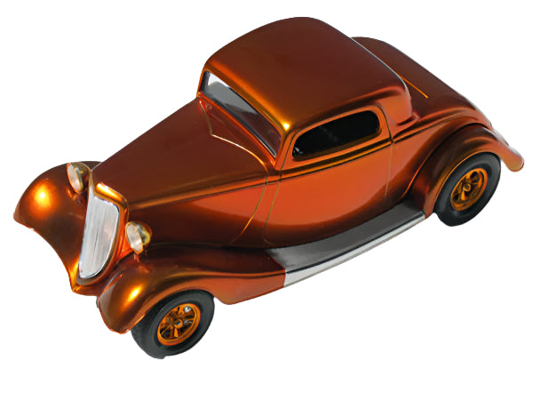 Model car with candy orange enamel paint finish, showcasing vintage design and glossy detailing from above